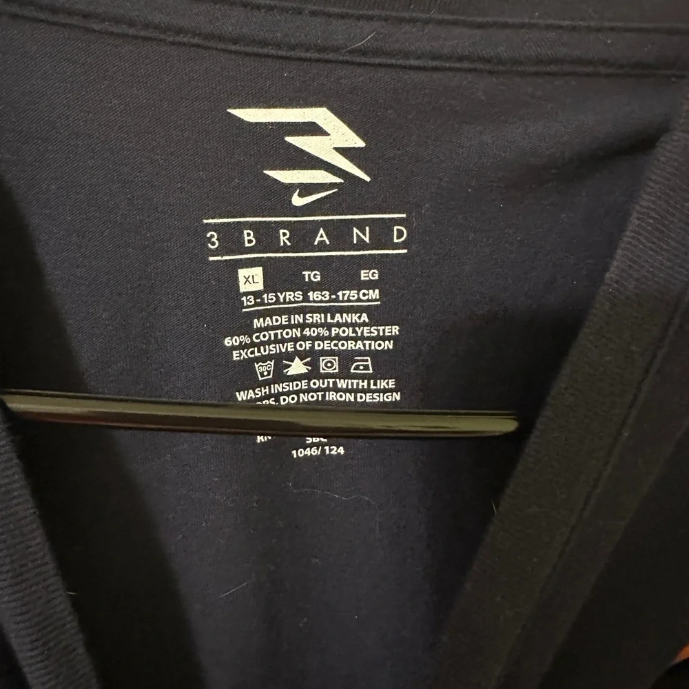 Nike Kids Tee with Orange Logo and White Detail